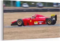 Schilderij - Ferrari-formule 1 in een race — 90x60 cm